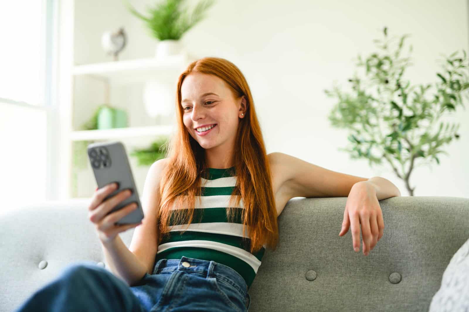 Student reviewing work on a phone