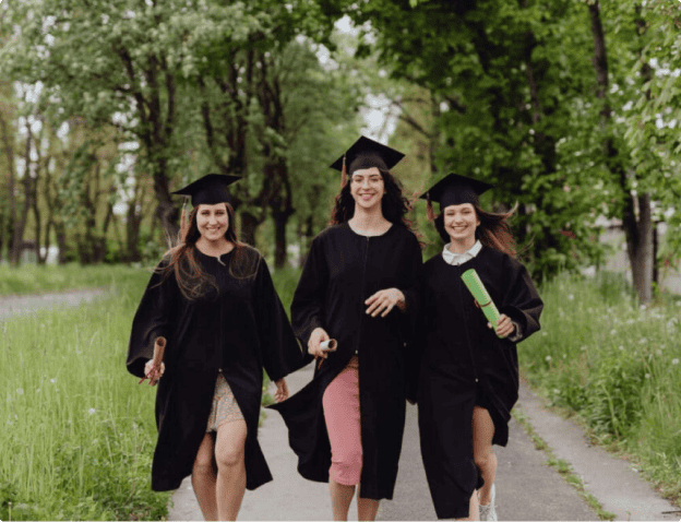 Graduates walking together outdoors
